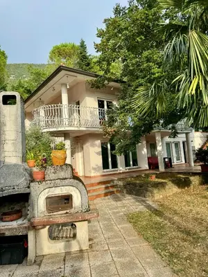 a house with an old oven in front of it at Vila Giovana in Vipava