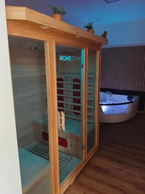 a small wooden cabinet with a boat inside of it at Wellness soba Amaris in Benedikt v Slovenskih Goricah