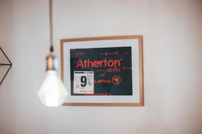 a picture in a frame hanging on a wall at Apartment Bolfenk Pohorje - Forest nest in Pohorje