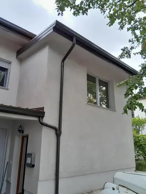 a pipe on the side of a house at Apartma Dea in Nova Gorica