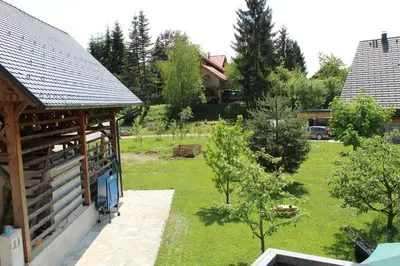 a view of a garden from a house at Vila Katarina in Hrastenica