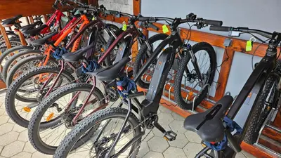 a group of bikes parked in a rack at Apartments Akacijev Izvir in Miklavž na Dravskem Polju