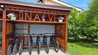 a group of bikes parked outside of a building at Apartments Akacijev Izvir in Miklavž na Dravskem Polju