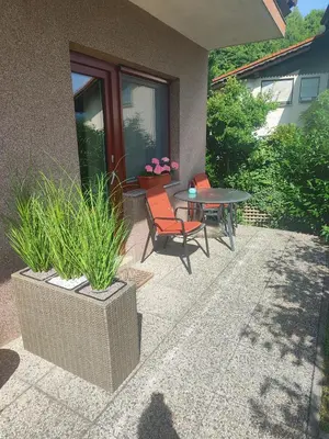 a patio with a table and two chairs and a table at Studio za 2 Marko Rogaška Slatina in Rogaška Slatina