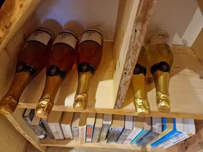a bunch of bottles of beer in a box at Cottage in Stara Gora 45720 in Debenec