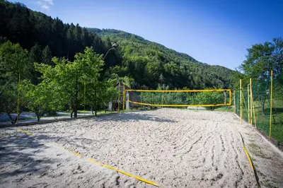 a volleyball goal in the middle of a road at Uaštarie u Luogu in Cerkno
