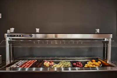 an oven filled with different types of fruits and vegetables at Hotel Toplice - Terme Čatež in Čatež ob Savi