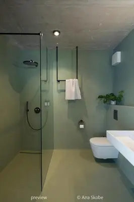 a bathroom with a shower and a toilet and a sink at Vila Slatina Weinderer in Svečina