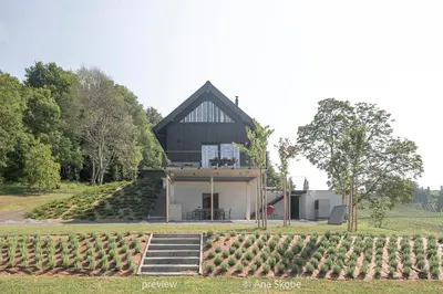 a house with a bunch of plants in front of it at Vila Slatina Weinderer in Svečina