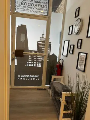 a room with a window with a view of a city at Suite Appartments Gregorčičeva in Ljubljana