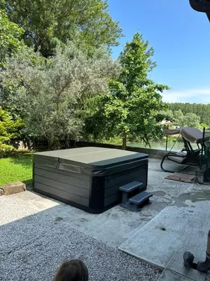 a large object sitting on the ground in a yard at Moulin a Vipava in Renče
