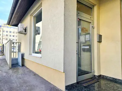 a door of a building with a window at Apartments Rubis in Stožice