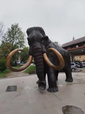 a statue of an elephant with large tusks at Apartma Mamut 1850 in Kamnik