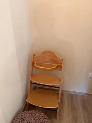 a wooden shelf in a corner of a room at Pr Šemnič in Kamnik