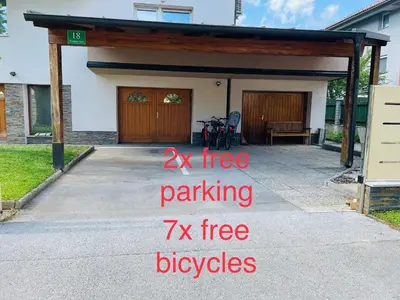 a x tree parking zx free bicycles in a garage at Apartment Armic in Ljubljana