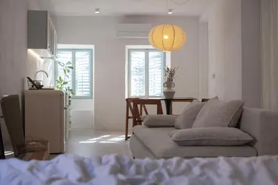 a living room with a couch and a table at Apartment Sturje in Ajdovščina