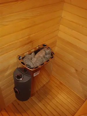 a trash can sitting on a wooden floor at Holiday Home Prdelanca in Luče