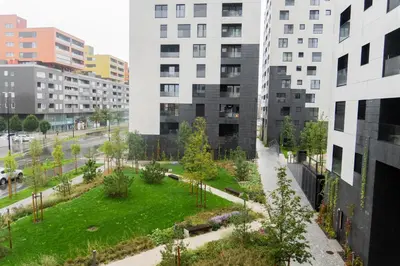 an aerial view of a park in a city with tall buildings at Ella's Cozy place in Ljubljana