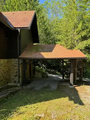a house with a pavilion in front of a yard at Chalet Neva in Loče pri Poljčanah