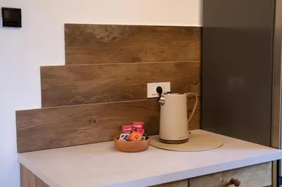 a coffeemaker sitting on top of a counter at Hiška Brajda in Rogaška Slatina