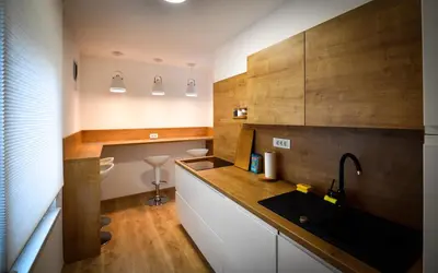 a kitchen with a sink and a counter top at CASA BOX PREMIUM free garage in Maribor