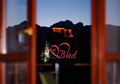 a window with a sign that says alpha lied at Heart Bled in Bled