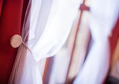 a close up of a white wedding veil at Heart Bled in Bled