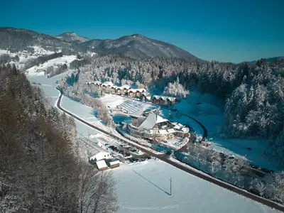 an aerial view of a resort in the snow at Appartments Vrba, Terme Snovik in Laze v Tuhinju