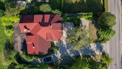 an overhead view of a house with a red roof at Brezov kot in Jesenice