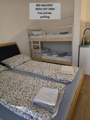 two bunk beds in a room withthritisthritisthritisthritisthritisthritisthritisthritisthritis at Halalko Konak in Šmarje-Sap