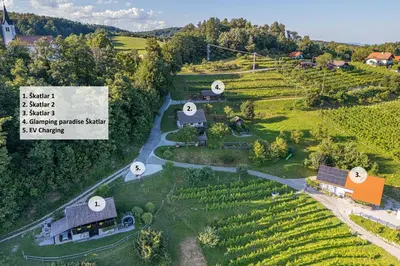 an aerial view of a farm with a house at Vineyard Cottage Skatlar 2 in Srednje Grčevje