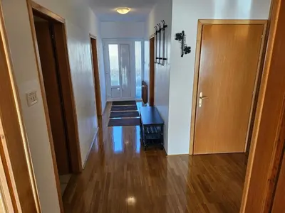 a hallway with a stairway leading to a room at Apartment Josipina in Preddvor