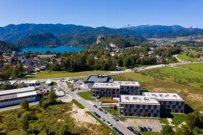 an aerial view of a campus with a lake at TB7 Bled in Bled