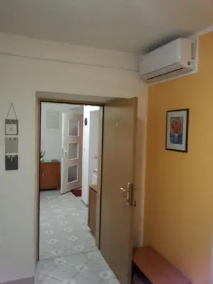 a hallway with an open door to a room at Apartmaji in sobe Kocjančič in Podčetrtek