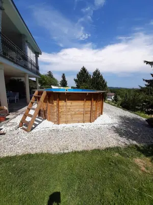 a house with a swimming pool in the yard at Hiška Janko in Metka in Ptuj