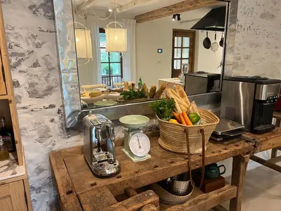 a kitchen with a counter with vegetables at PAVI APARTMENTS River Estate Krka in Krka