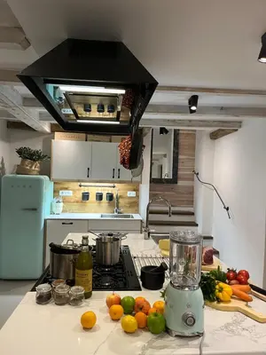 a kitchen with a counter with fruits and vegetables on it at PAVI APARTMENTS River Estate Krka in Krka