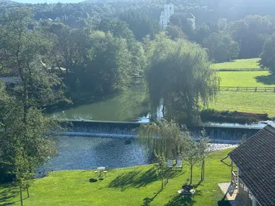 an aerial view of a pond in a field at PAVI APARTMENTS River Estate Krka in Krka