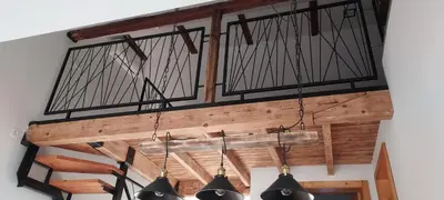a group of lights hanging from a ceiling at Hiša Galeria in Loče pri Poljčanah