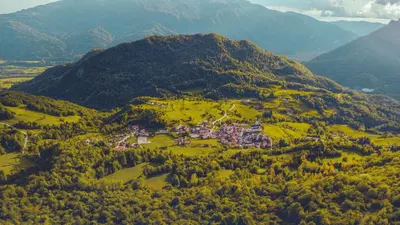 an aerial view of a village on a mountain at Apartment and Room Natasa in Kobarid