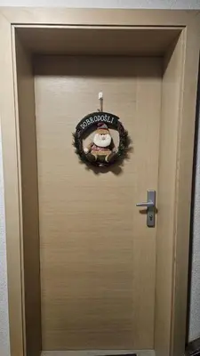 a door with a santa claus sign on it at App DA-LI SPORT KOPE in Slovenj Gradec
