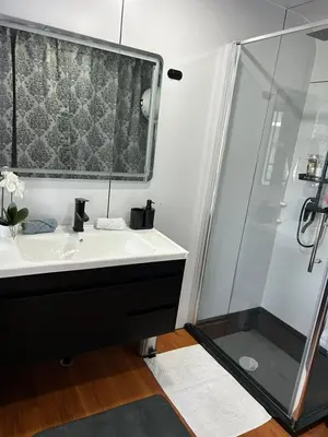 a bathroom with a sink and a shower at mobile house Rest Area in Ljubljana