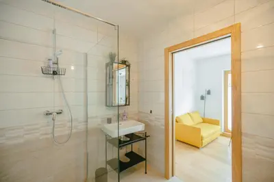 a bathroom with a shower and a sink at Nordic House Apartment A1 in Kranjska Gora