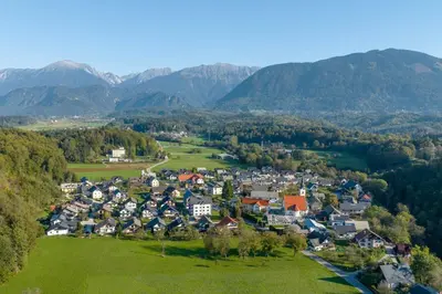 an aerial view of a small town in the mountains at Cozy stay near Bled in Radovljica