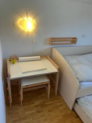 a room with a desk and a bed with a bed gmaxwell gmaxwell gmaxwell at Cozy stay near Bled in Radovljica