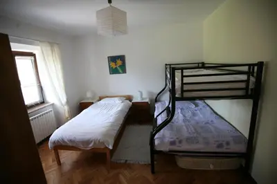 a bedroom with a bunk bed and a bunk bedouble at Chalet Bovec in Bovec