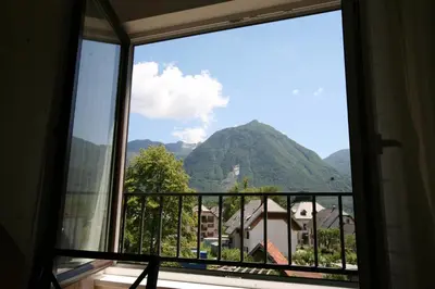 a window with a view of a mountain view at Chalet Bovec in Bovec