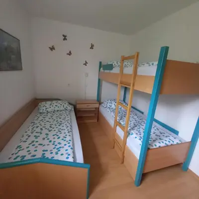 two bunk beds in a small room with at Apartma pri Milki in Cerkno