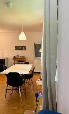 a dining room with a table and chairs at Lotti's Apartment in Kranjska Gora