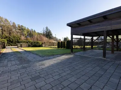a patio with a pavilion in a park at Apartment Pohorje Sun - Entire house in Maribor